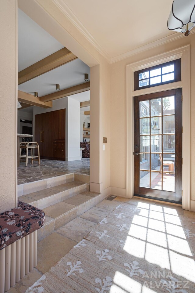 727 Plymouth Rd SE, East Grand Rapids, MI 49506 - entrance foyer with ornamental molding and baseboards
