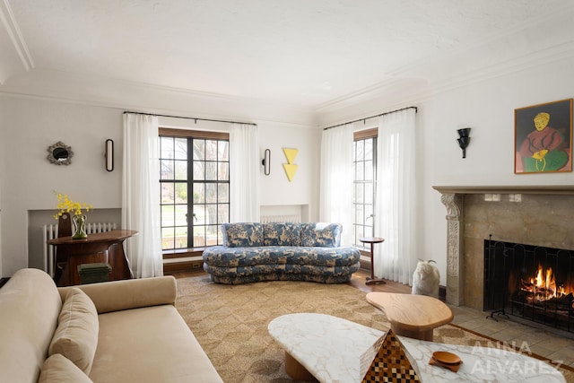 727 Plymouth Rd SE, East Grand Rapids, MI 49506 - living area featuring a high end fireplace, ornamental molding, and healthy amount of natural light
