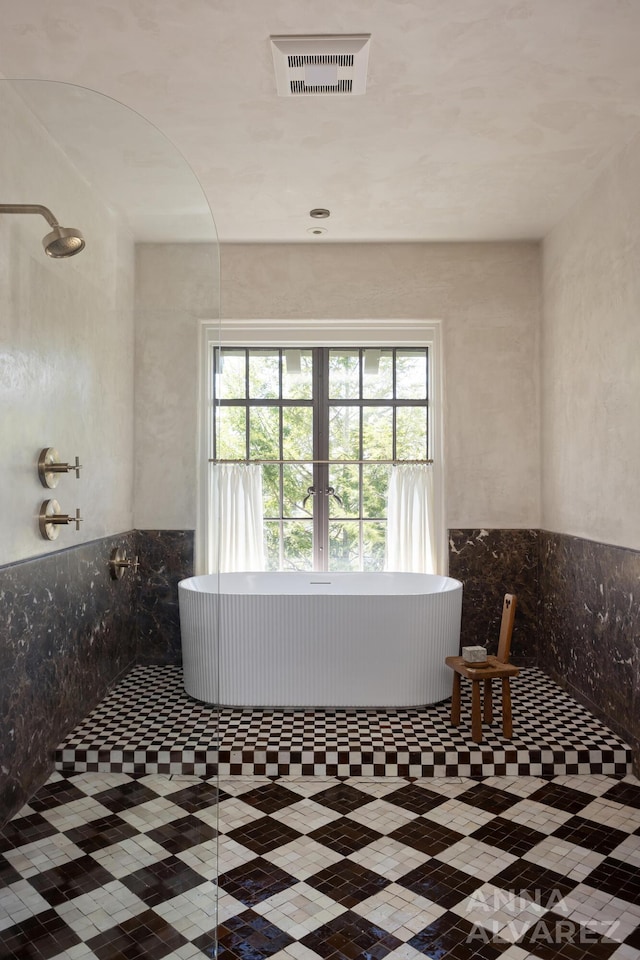 727 Plymouth Rd SE, East Grand Rapids, MI 49506 - full bath featuring a shower and wainscoting