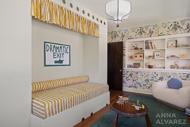 727 Plymouth Rd SE, East Grand Rapids, MI 49506 - sitting room with wood finished floors and wallpapered walls