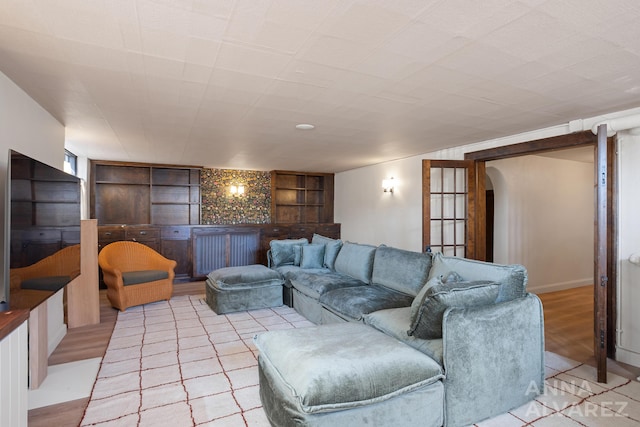 727 Plymouth Rd SE, East Grand Rapids, MI 49506 - living area featuring built in features and arched walkways