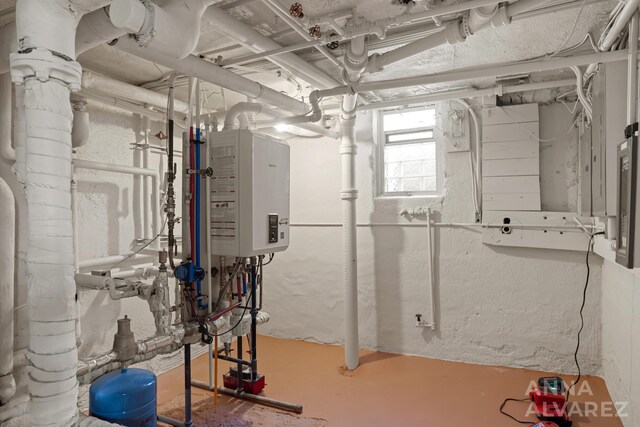 727 Plymouth Rd SE, East Grand Rapids, MI 49506 - below grade area featuring tankless water heater