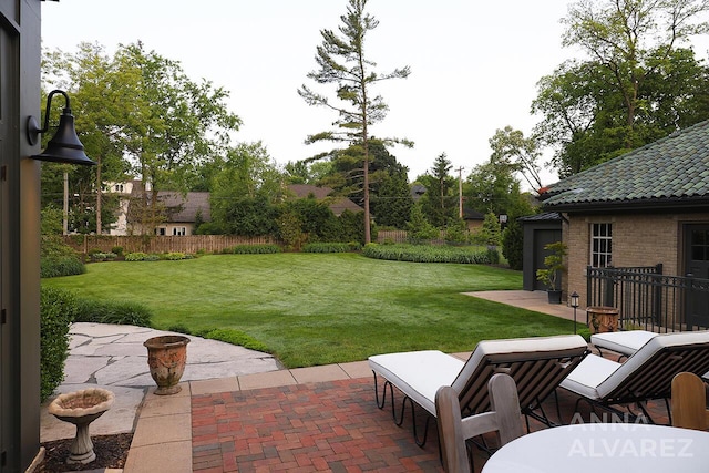727 Plymouth Rd SE, East Grand Rapids, MI 49506 - view of green lawn with a patio