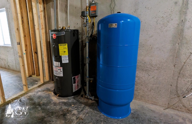 utility room with electric water heater