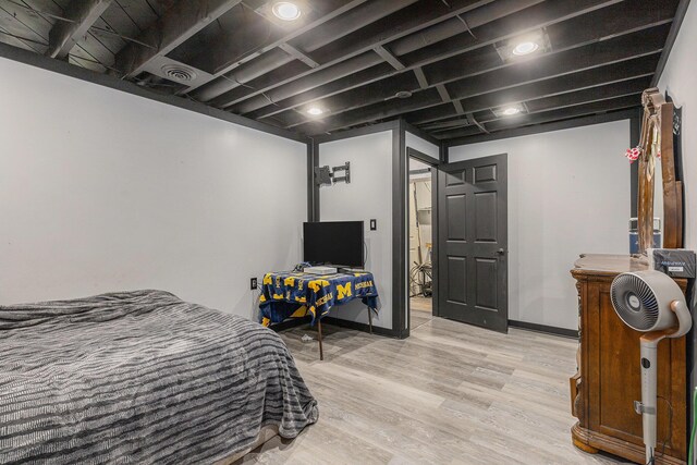 6665 E Lake St, Sand Lake, MI 49343 - bedroom featuring light wood-style flooring and baseboards