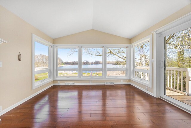 6665 E Lake St, Sand Lake, MI 49343 - unfurnished sunroom featuring plenty of natural light, visible vents, and hardwood / wood-style flooring