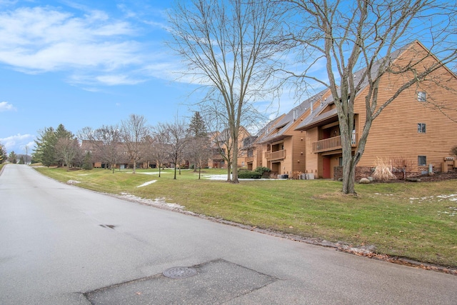 view of road with a residential view