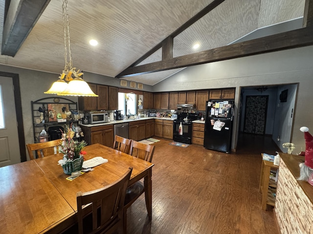 dining room featuring vaulted ceiling with beams and dark wood-type flooring