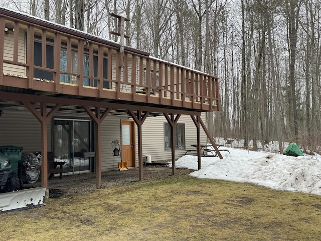 rear view of property with a deck