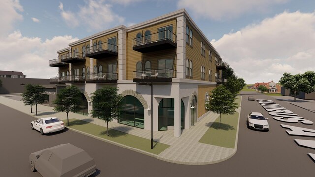 630 Columbus Ave Unit 33, Grand Haven, MI 49417 - view of building exterior with uncovered parking