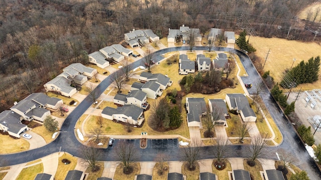 birds eye view of property with a residential view