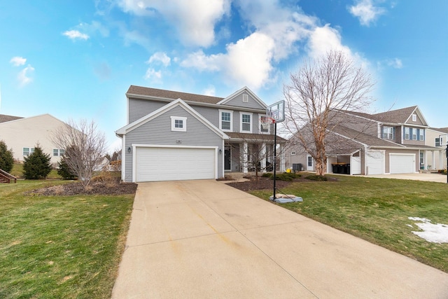 traditional-style home with a garage, concrete driveway, and a front lawn