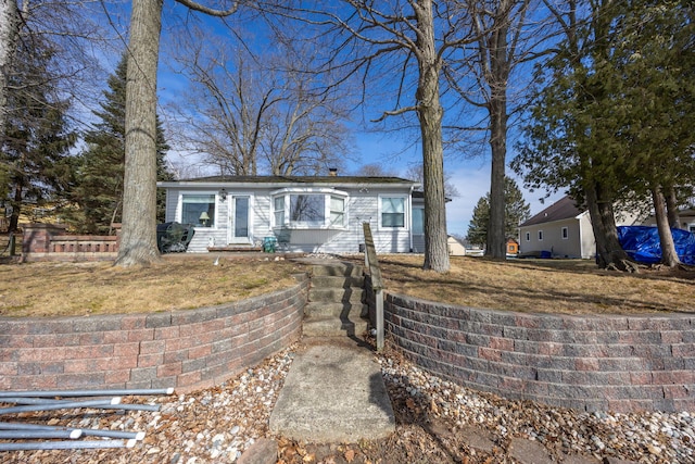8581 Lynwood Ln, Mecosta, MI 49332 - view of front of home with a chimney