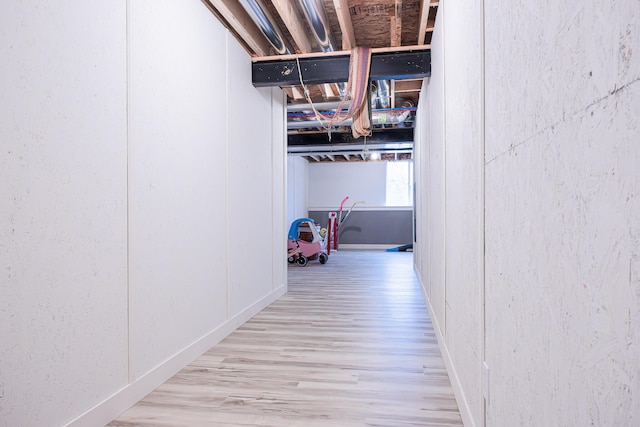 hallway with wood finished floors