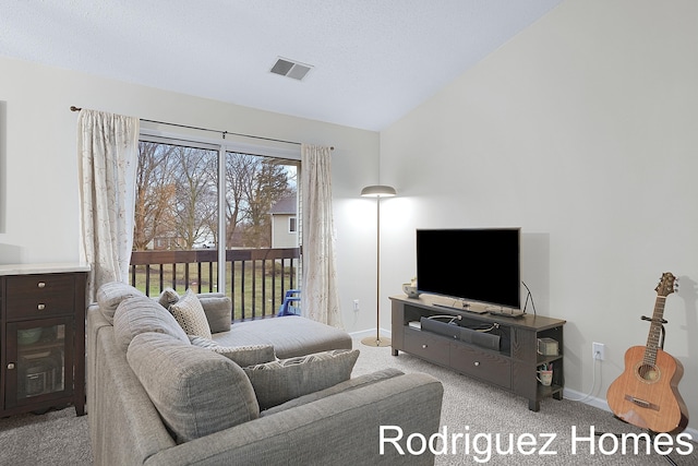 living room with carpet, visible vents, vaulted ceiling, and baseboards