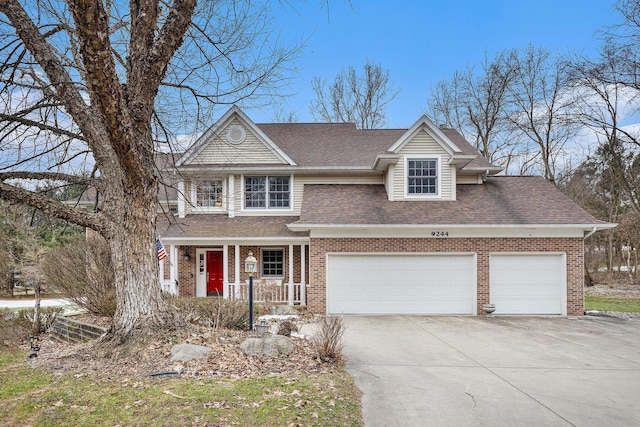 view of front of home with a porch, a garage, brick siding, a shingled roof, and concrete driveway