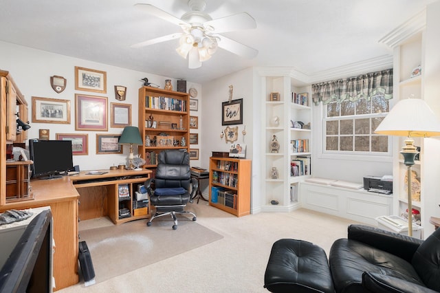 office with carpet floors and a ceiling fan