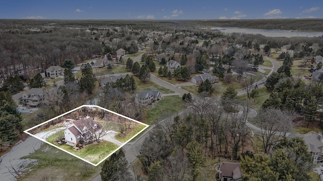 birds eye view of property with a residential view