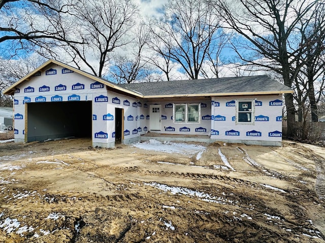 property under construction with a garage