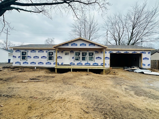 property under construction featuring a garage