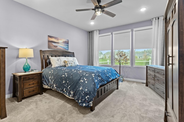 bedroom with carpet floors, recessed lighting, ceiling fan, and baseboards