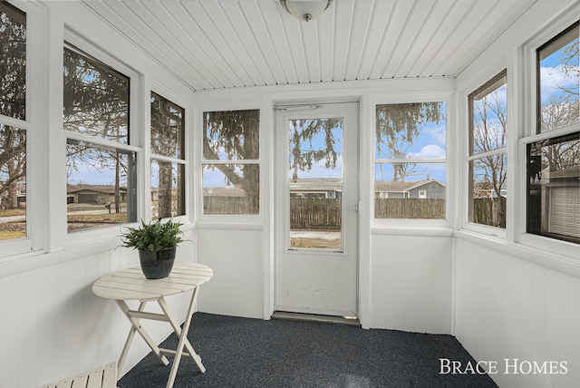 sunroom / solarium with wood ceiling