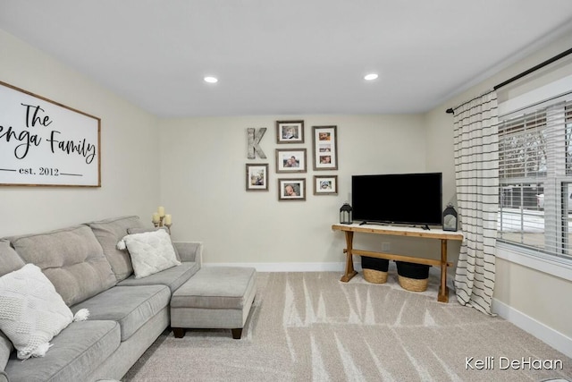 carpeted living room featuring recessed lighting and baseboards