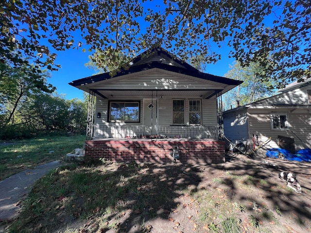 view of front of home featuring covered porch