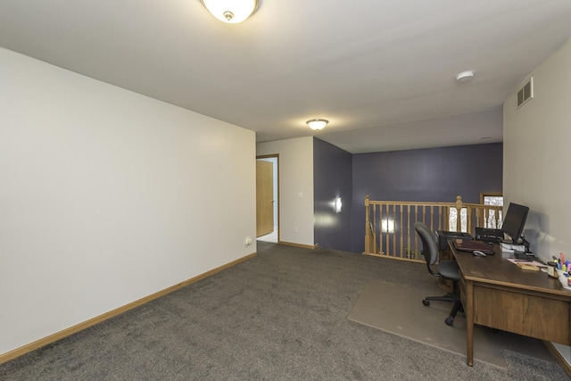 carpeted home office featuring baseboards and visible vents