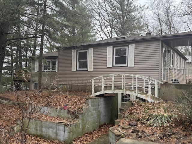 view of front of house featuring stairway