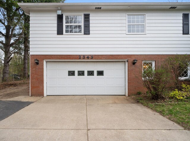 garage with driveway