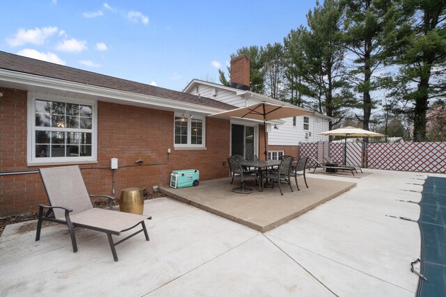 view of patio / terrace with fence