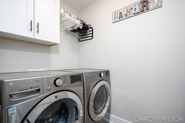 laundry area featuring cabinet space and independent washer and dryer