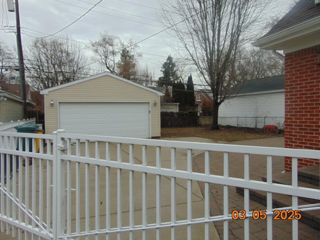 detached garage with fence