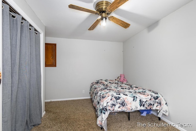 bedroom featuring carpet flooring, ceiling fan, and baseboards