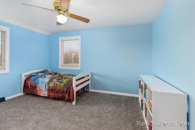 bedroom with carpet floors, baseboards, and a ceiling fan