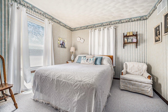 1910 W F Ave, Kalamazoo, MI 49009 - carpeted bedroom featuring wallpapered walls