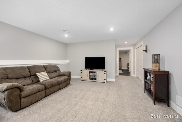 living room featuring carpet, visible vents, baseboards, and recessed lighting