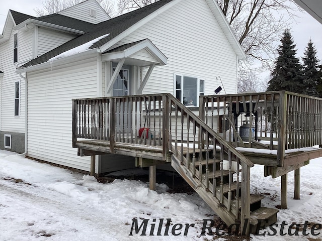 view of snow covered deck