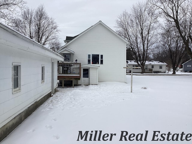 view of snow covered house