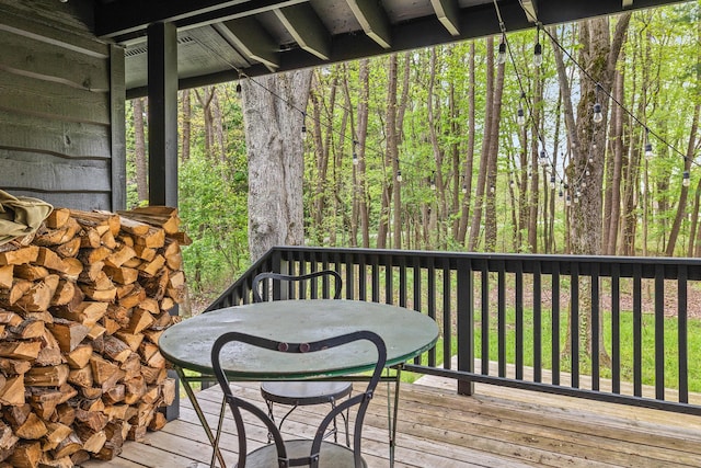 deck featuring a forest view