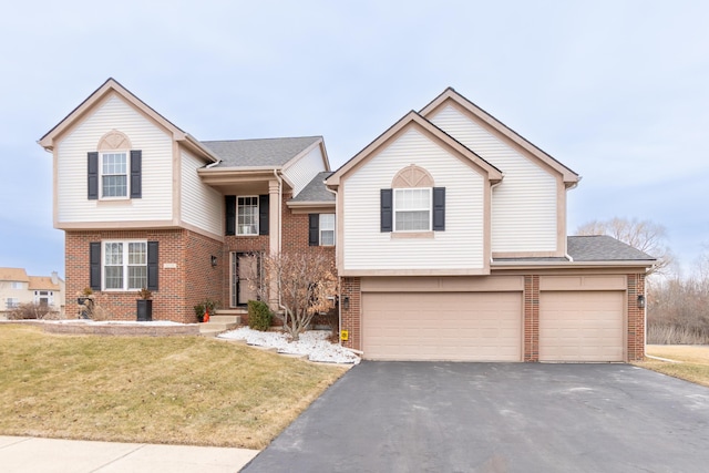 view of front of property with brick siding, aphalt driveway, a front yard, roof with shingles, and an attached garage