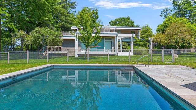 view of pool featuring a fenced in pool, a patio area, a yard, and fence