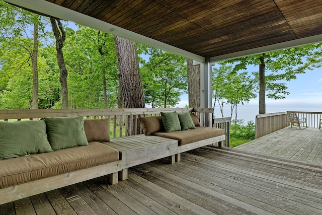 wooden deck featuring an outdoor living space