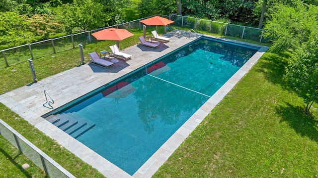 view of swimming pool with a fenced backyard, a fenced in pool, a patio, and a yard