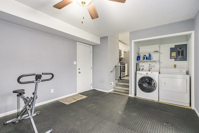 washroom with laundry area, independent washer and dryer, electric panel, and baseboards