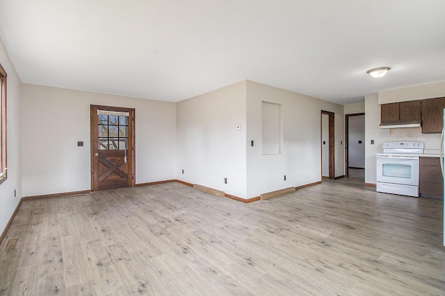 unfurnished living room with light wood-style flooring and baseboards