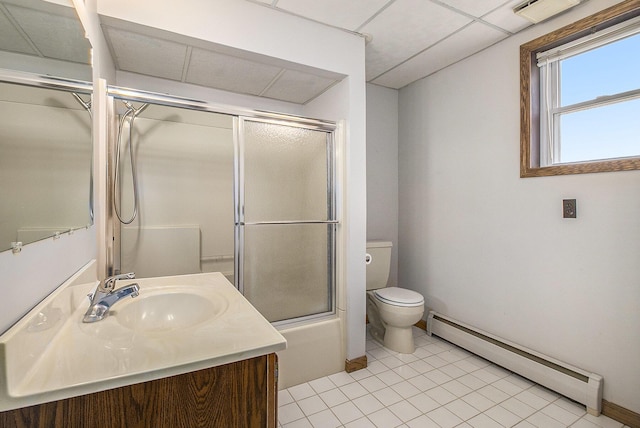 bathroom featuring visible vents, toilet, baseboard heating, vanity, and a drop ceiling