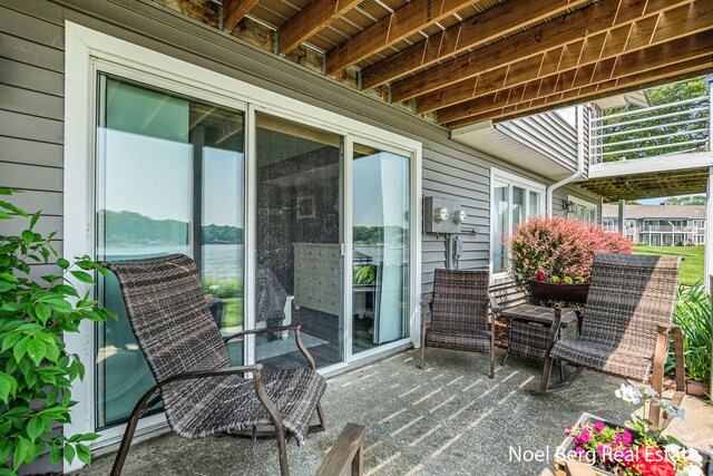 606 Edgewater Ct, Spring Lake, MI 49456 - view of patio / terrace with a balcony