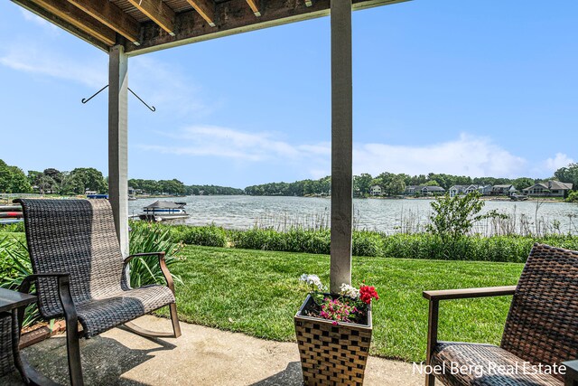 606 Edgewater Ct, Spring Lake, MI 49456 - view of patio / terrace with a water view